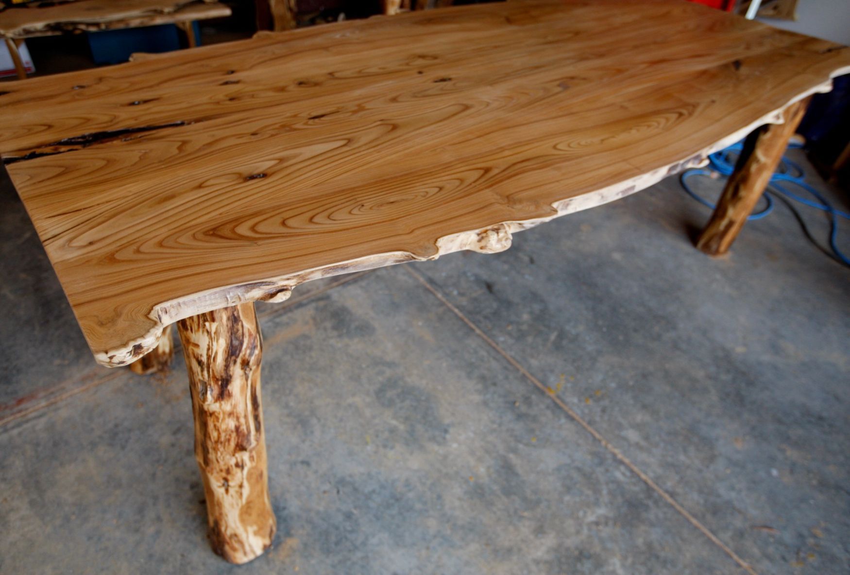 This is a live-edge dining table